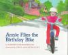 Annie_flies_the_birthday_bike